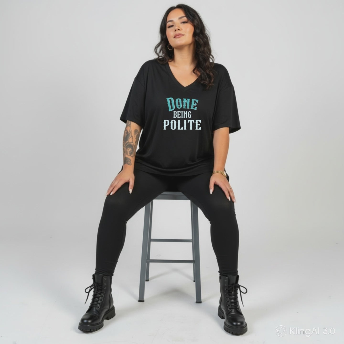Woman wearing Done Being Polite College oversized black graphic tee plus size Australian streetwear brand Bae Bands