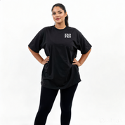 Woman wearing Zero Fucks oversized black graphic tee plus size Australian streetwear brand Bae Bands