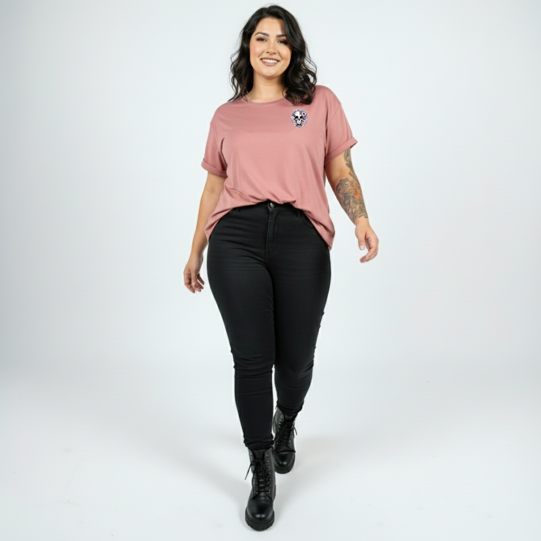 Woman wearing Roses and Bones skull graphic dusty pink tee Australian plus size streetwear Bae Bands