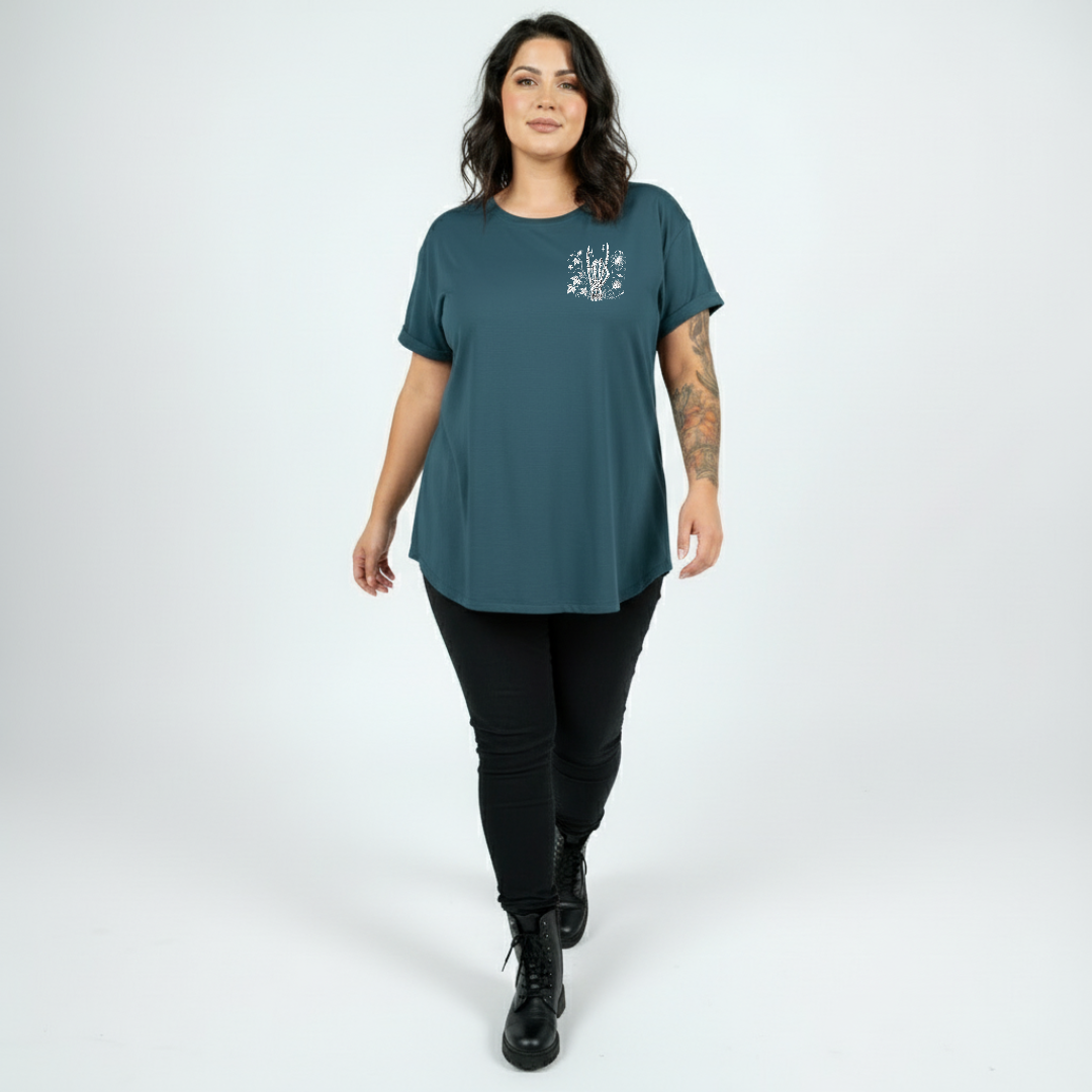 Woman wearing Inner Peace straight fit teal graphic tee Australian plus size streetwear Bae Bands
