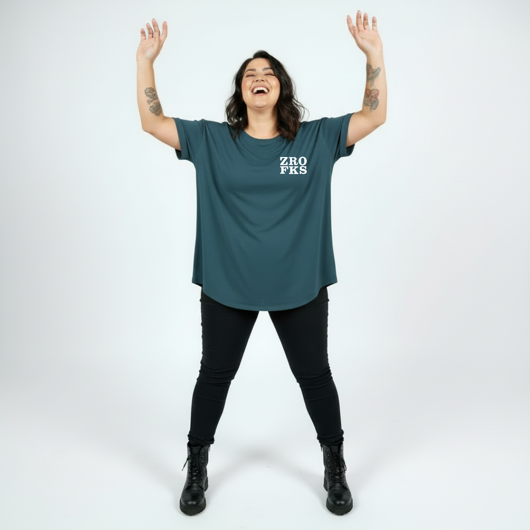Woman wearing Zero Fucks straight fit teal graphic tee Australian plus size streetwear Bae Bands