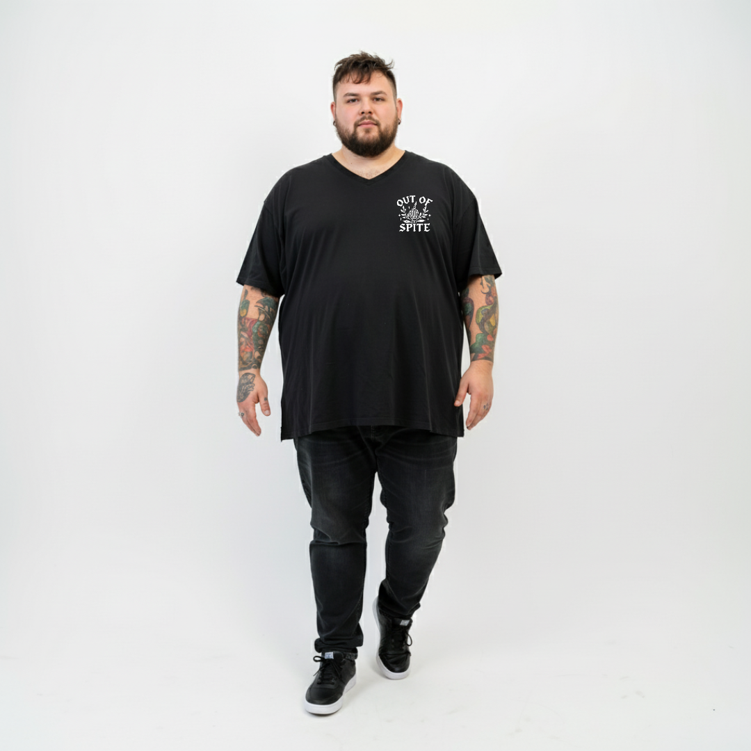 Woman wearing Surviving oversized black V neck graphic tee plus size Australian streetwear brand Bae Bands